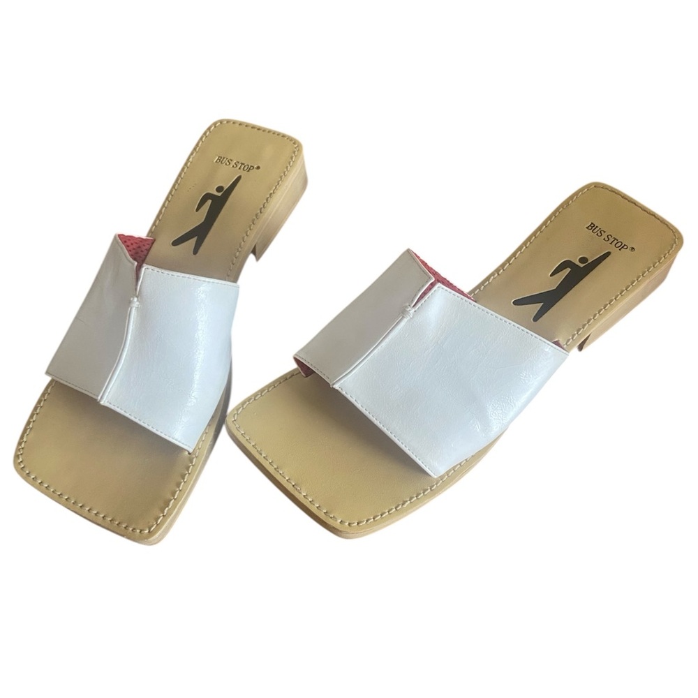 Bus stop brand white sandals and a size 9M